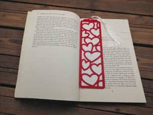 Bookmark with tassel laid in book