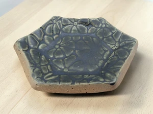 Handcrafted Ceramic Pottery Trinket Bowl or Jewelry Dish Blue Hexagon on table