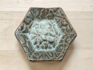 Handcrafted Ceramic Pottery Trinket Bowl or Jewelry Dish Green Hexagon on table
