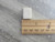 A handmade clay dangle ceramic rectangle clay dangle earring. With ruler. A handmade clay dangle ceramic rectangle clay dangle earring. With ruler.