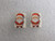 A set of handmade ceramic Christmas Santa clay stud earrings. A set of handmade ceramic Christmas Santa clay stud earrings.