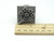 A doodle flower bouquet square clay pottery stamp. With ruler. Measuring  approximately 1.25 inches wide.