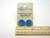 A set of handmade Large Blue Round Circles clay post earrings. On an A Mayes Pottery card. Made in America.