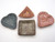 Handcrafted Ceramic Trinket Bowls & Jewelry Dishes – Made in the United States. Showing all four trinket bowls & Jewelry dishes: Two hearts, a triangle & square shape. Handcrafted Ceramic Trinket Bowls & Jewelry Dishes – Made in the United States. Showing all four trinket bowls & Jewelry dishes: Two hearts, a triangle & square shape.