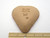 The back side of the heart bowl. It's plain terracotta with PFM and Made in the Smoky Mountains imprinted on the back. With ruler. Measuring approximately 3 inches wide at the top of the heart. The back side of the heart bowl. It's plain terracotta with PFM and Made in the Smoky Mountains imprinted on the back. With ruler. Measuring approximately 3 inches wide at the top of the heart.