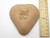 The back side of the heart bowl. It's plain terracotta with PFM and Made in the Smoky Mountains imprinted on the back. With ruler. Measuring approximately 3.5 inches in length. The back side of the heart bowl. It's plain terracotta with PFM and Made in the Smoky Mountains imprinted on the back. With ruler. Measuring approximately 3.5 inches in length.
