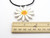 A Large Daisy Handmade Ceramic Pendant Necklace. With ruler. Measuring approximately 1.5 inches wide. A large daisy handmade ceramic pendant necklace A Large Daisy Handmade Ceramic Pendant Necklace. With ruler. Measuring approximately 1.5 inches wide. A large daisy handmade ceramic pendant necklace