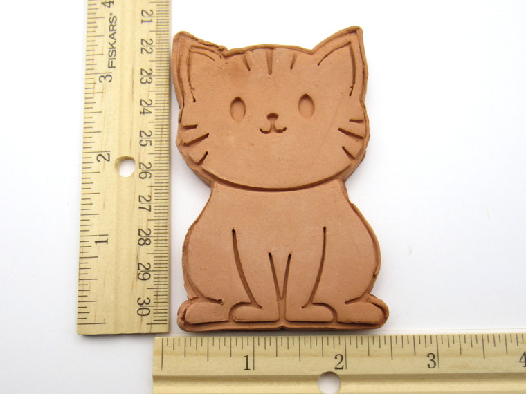 A cute cat brown terracotta clay sugar saver. Handcrafted in the USA. With rulers. Measuring approximately 3.5 by 2.5 inches.
