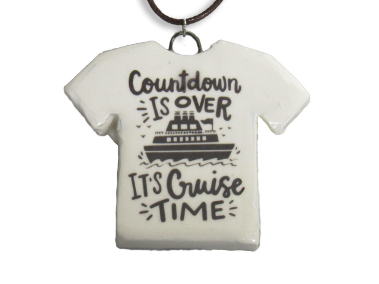 A handmade ceramic Tshirt pendant with the words "Countdown is Over Its Cruise Time".