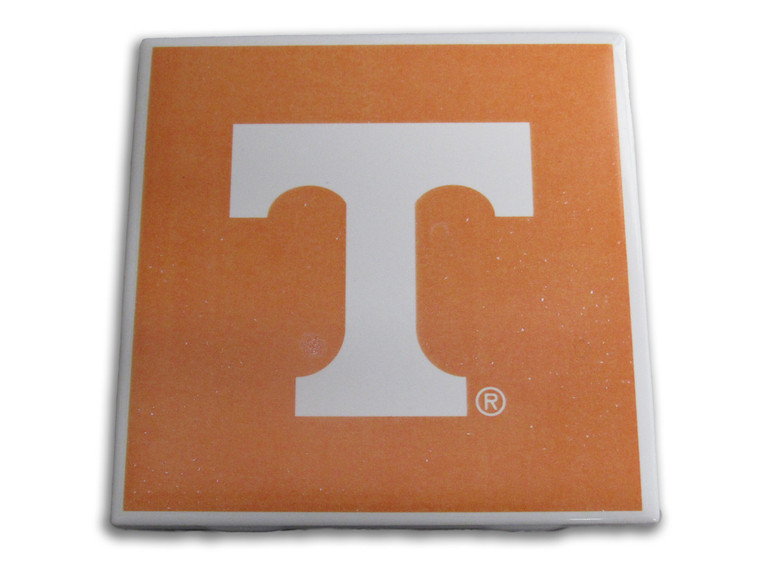 A UT Vols White Power T on an orange Ceramic Coaster Hot Pad Trivet.