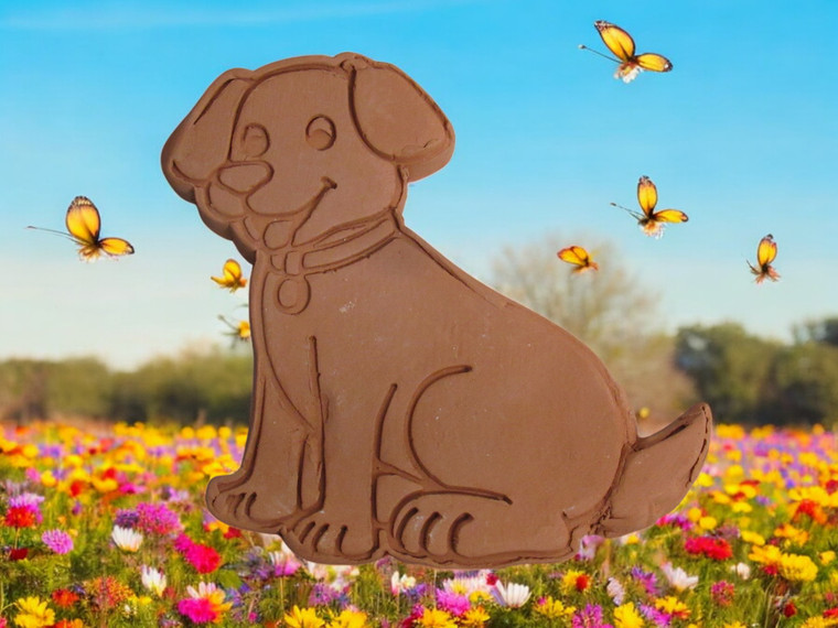 A Handcrafted Puppy Dog Brown Terracotta Clay Sugar Saver. With a field and Butterflies look background.