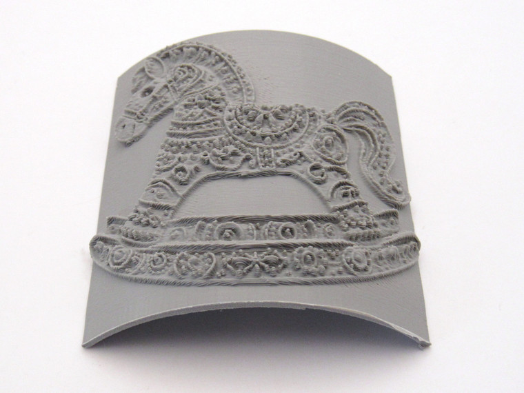 A rocking horse texture image clay pottery stamp. In a laying position.