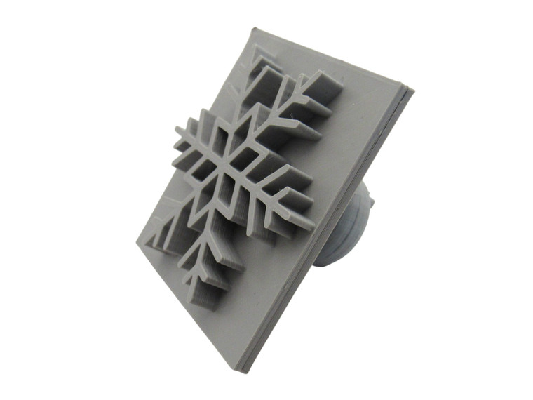 The side view of a Snowflake Mug Clay Stamp for handbuild pottery (V1).