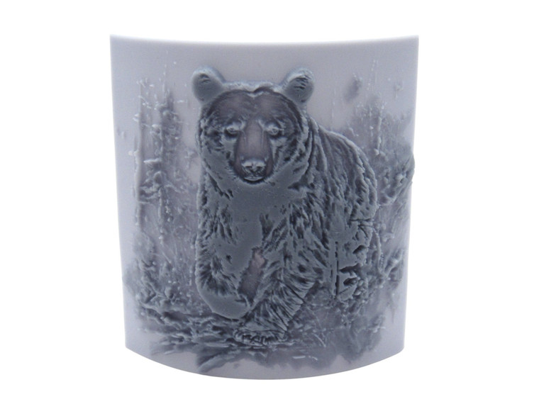 A texture image clay pottery stamp featuring a Bear in the Woods.