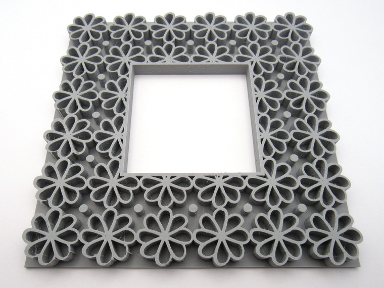 A Flowers and Tiny Dots Frame Clay Stamp for handbuild Pottery.