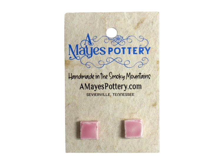 A set of Small Pink Square Ceramic Post Stud Earrings Handmade in USA. On an A Mayes Pottery card. A set of small pink square ceramic post stud earrings Handmade in USA.