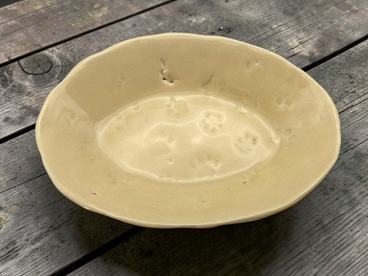 Handcrafted Ceramic Pottery Trinket Bowl or Jewelry Dish for Pet Lover in Tan on table
