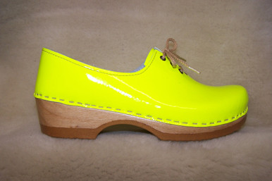 neon yellow dansko clogs
