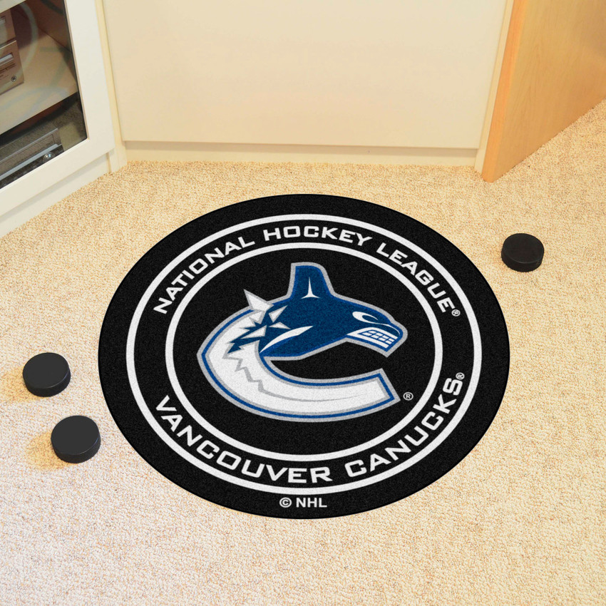 NHL - Vancouver Canucks Puck Mat 27" diameter