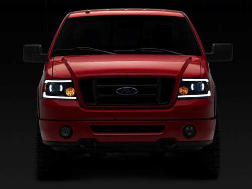 Raxiom 04-08 Ford F-150 Axial Series Projector Headlights with LED Bar- Black Housing- Clear Lens - T566363 Photo - Close Up