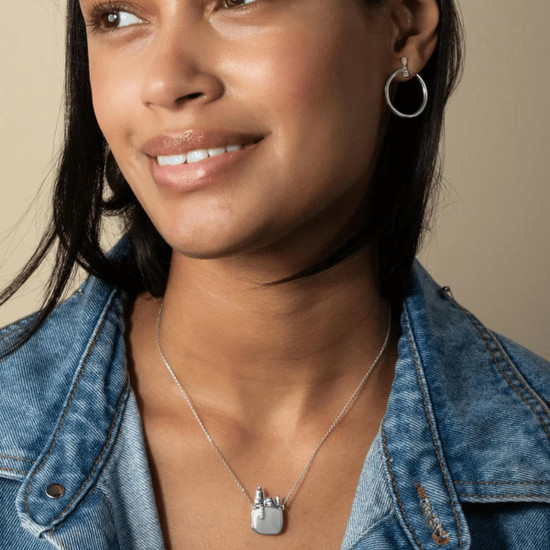 Snoopy x Viv Slim Locket in Sterling Silver by Monica Rich Kosann