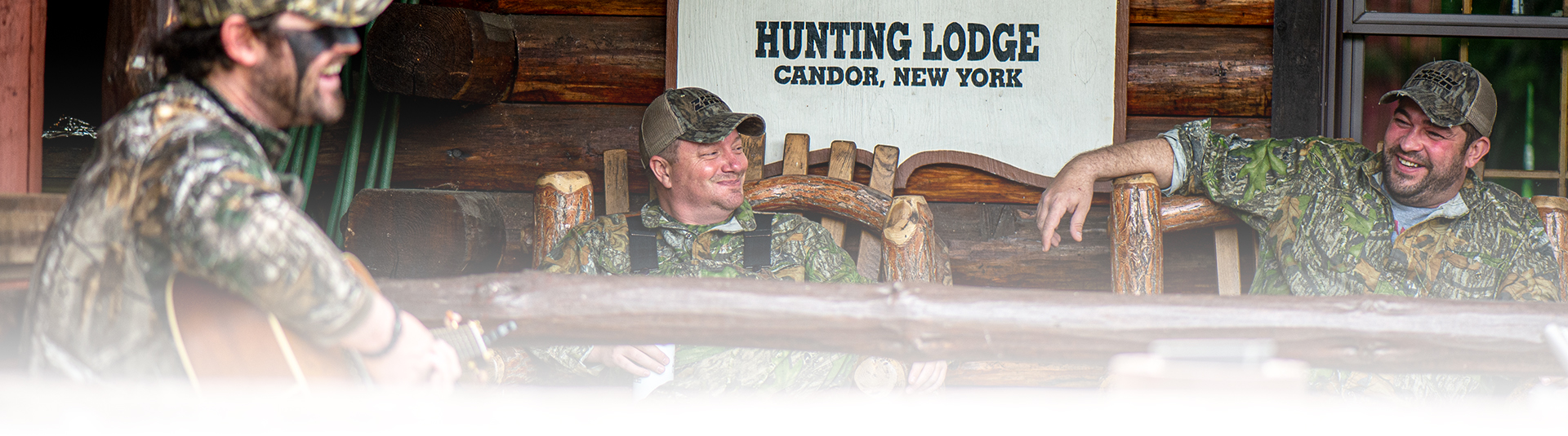 Turkey hunters outside lodge