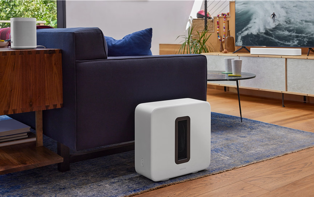 Sonos Beam Gen 2 with a Sonos Sub and surround speakers in a living room