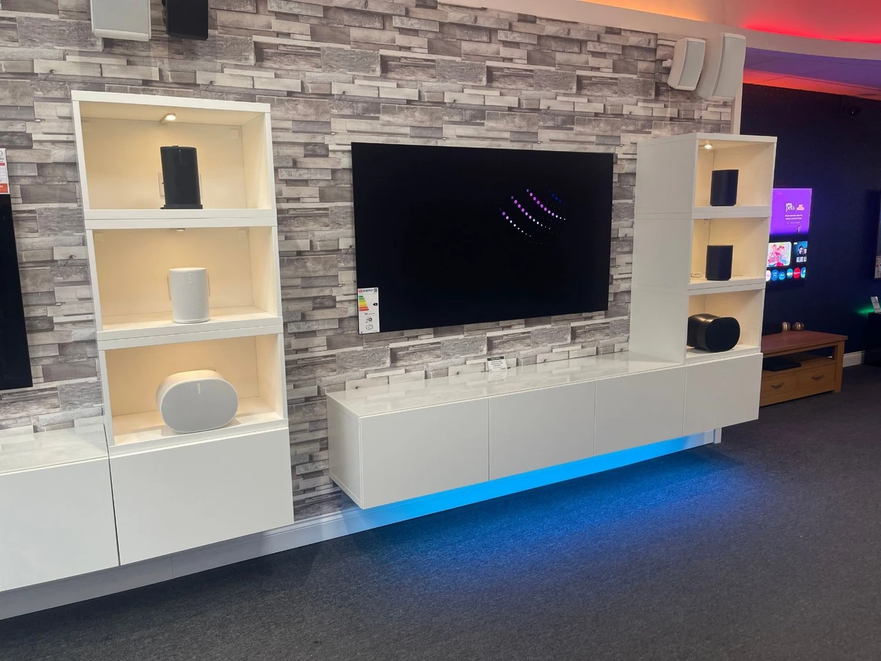 Sonos Era 300 and Era 100 speakers on the demo wall in the Jennings Sound & Vision showroom, Fleet