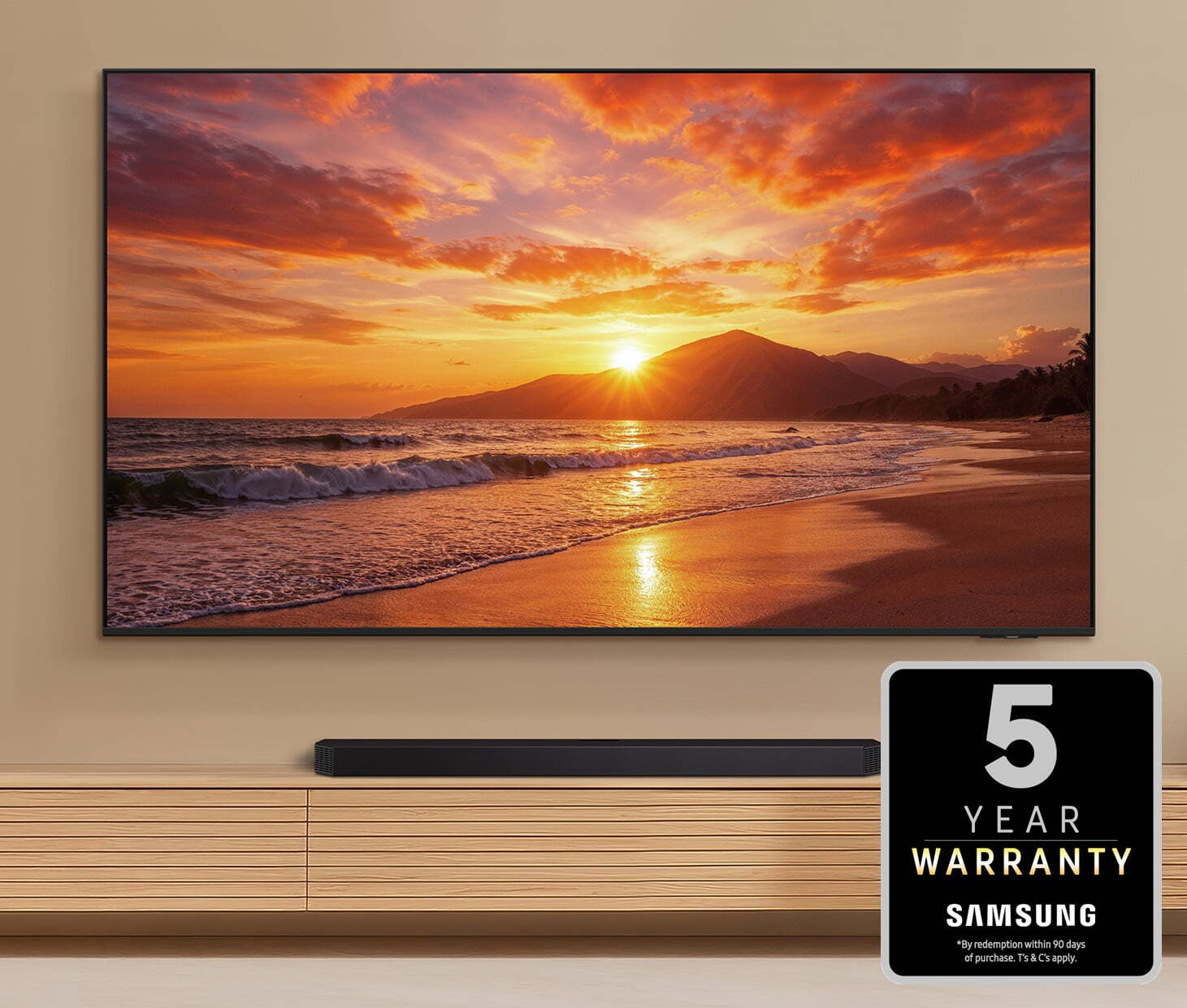 Samsung TV wall-mounted with soundbar and Samsung 5 Year Warranty badge
