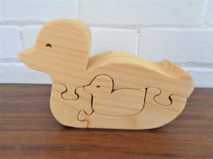 Hand Carved Duck with Triplets Puzzle