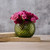 Close-up of hobnail texture pattern on moss green Bohemia crystal vase