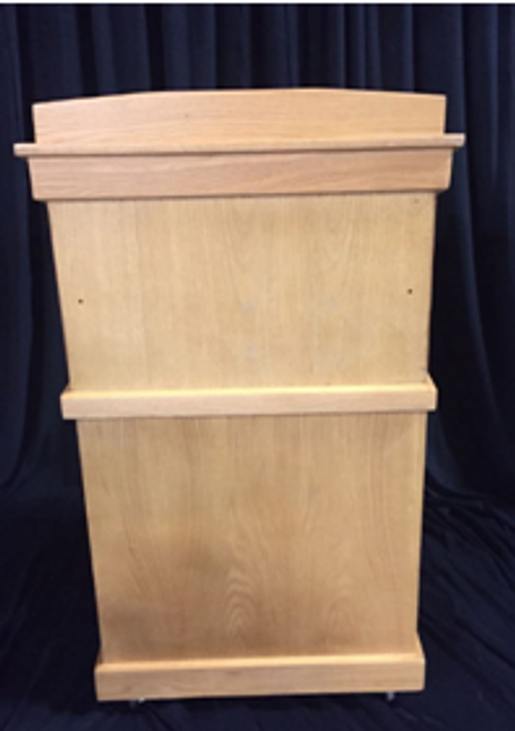 wooden podium in front of a black stage curtain wooden podium in front of a black stage curtain