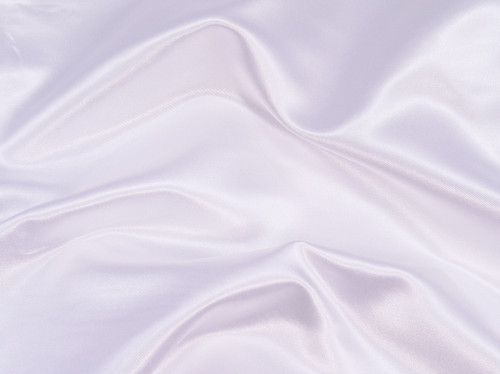 close up of satin sash in white close up of satin sash in white