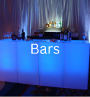 Bars written on a background of a lighted bar table