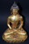 Gilt Bronze Buddha in Patchwork Robe