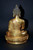 Gilt Bronze Buddha in Patchwork Robe