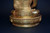 Gilt Bronze Buddha in Patchwork Robe