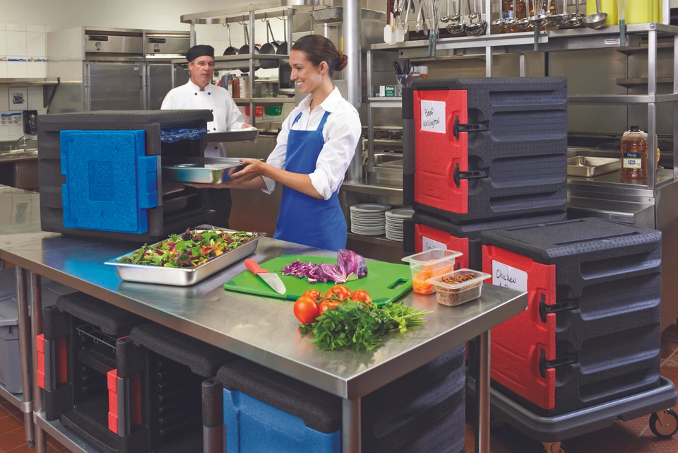 metro mightylite insulated food carriers in a commercial kitchen