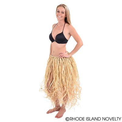 Hawaiian woman in grass skirt and coconut bra dancing Stock Photo