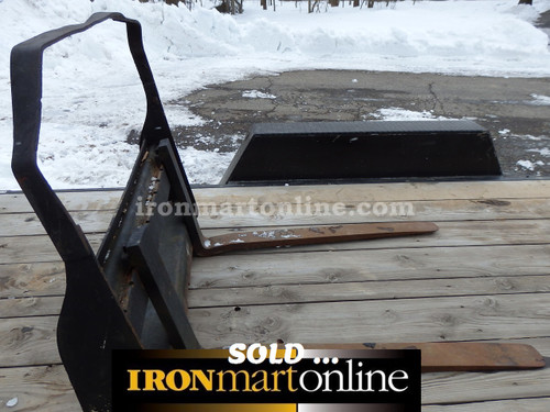 4,000 lb Skid Steer Forks, in very good condition.