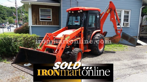 Kubota M59 Backhoe Loader, in very good condition.