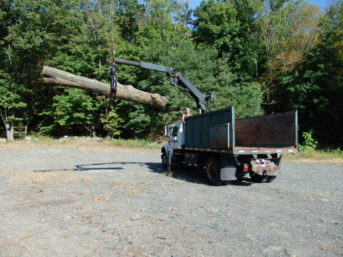 International chip truck w hydraulic grapple knuckle boom