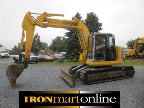 2001 Komatsu PC 128UU, in very good condition.