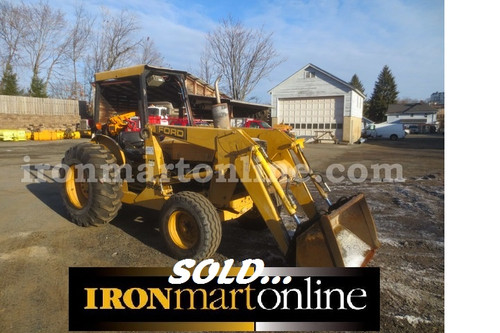 1991 Ford New Holland 345C Tractor, powered by a 52 hp Ford diesel engine.