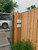 Rear View of 2 Urban Back Opening Zincalume Modern Mailboxes installed in a wooden privacy fence. Rear View of 2 Urban Back Opening Zincalume Modern Mailboxes installed in a wooden privacy fence.