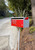 Metro Front Opening Aluminum Modern Mailbox with red door and flag on a modern Box Design mailbox post Metro Front Opening Aluminum Modern Mailbox with red door and flag on a modern Box Design mailbox post
