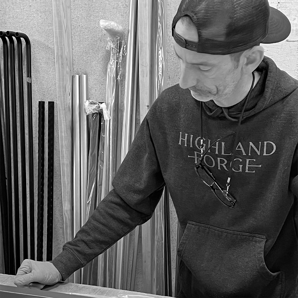 Highland Forge brass drapery rod installed with linen curtains