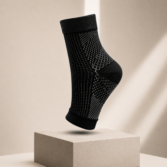 Black ankle compression sleeve for plantar fasciitis and ankle pain relief with breathable support design