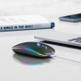 RGB backlit wireless mouse on desk setup — rechargeable Bluetooth mouse with colorful LED lighting for gaming and office use