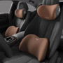 Driver using ergonomic memory foam headrest and lumbar seat cushion set for neck and lower back support in car